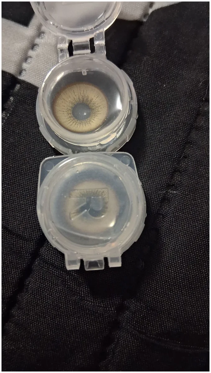 Real buyer photo wearing or showing Olive Sand Hazel colored contacts